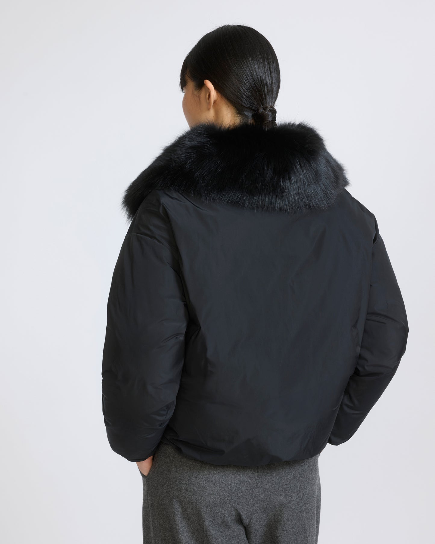 Short technical fabric down jacket with detachable fox fur collar