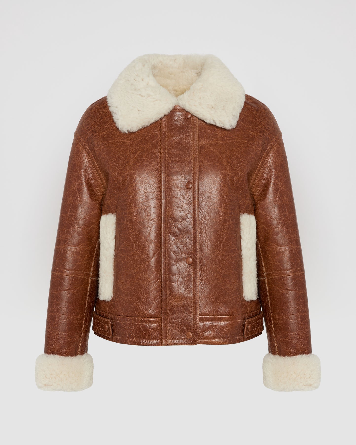 Veste courte en peau lainée d'agneau de Toscane curly avec finition vintage