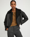 Cropped biker jacket in patent merino