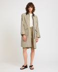 Parka en tissu jacquard motif carreaux avec col en cuir