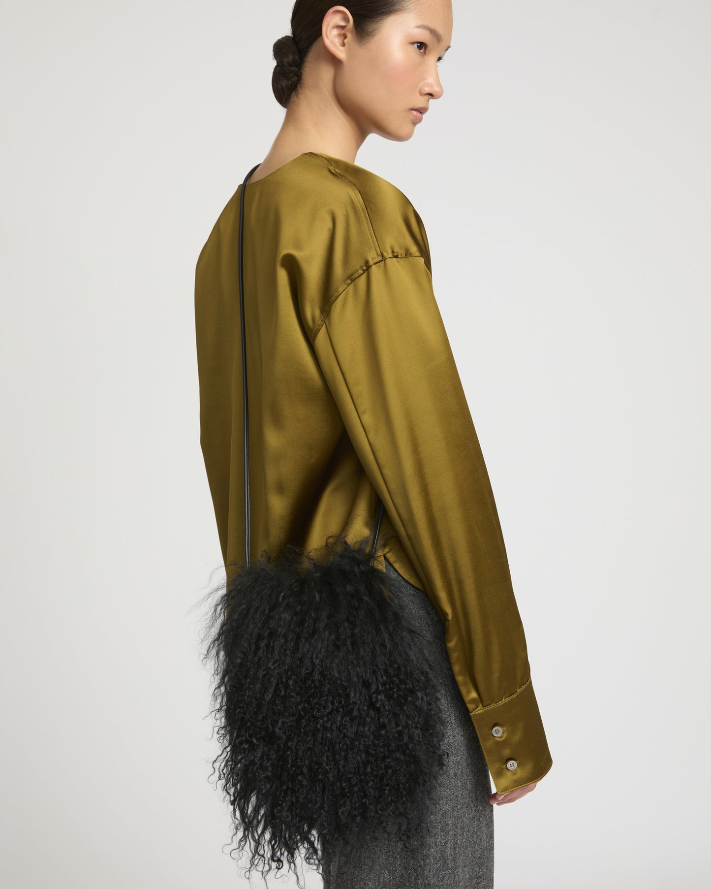 Small Bag in Leather and Mongolian lambwool