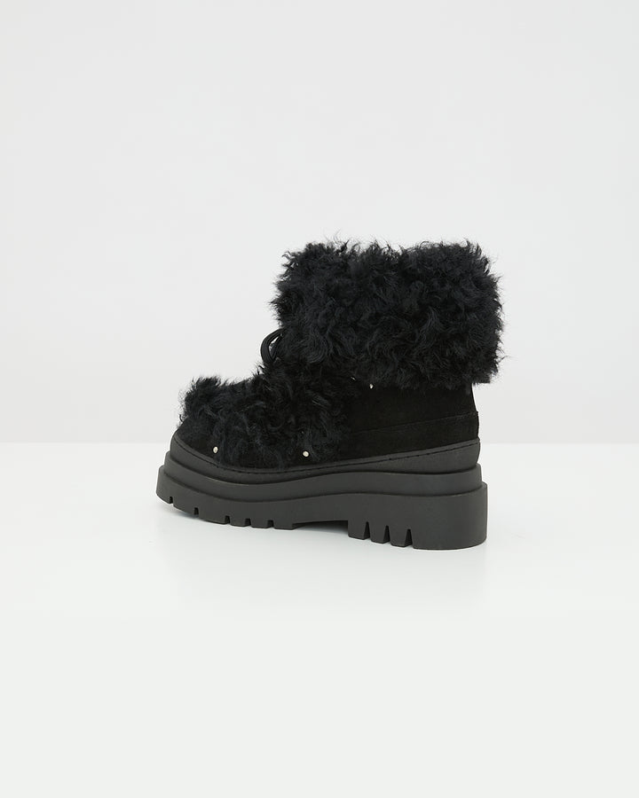 Ankle boots in leather and Lacon shearling