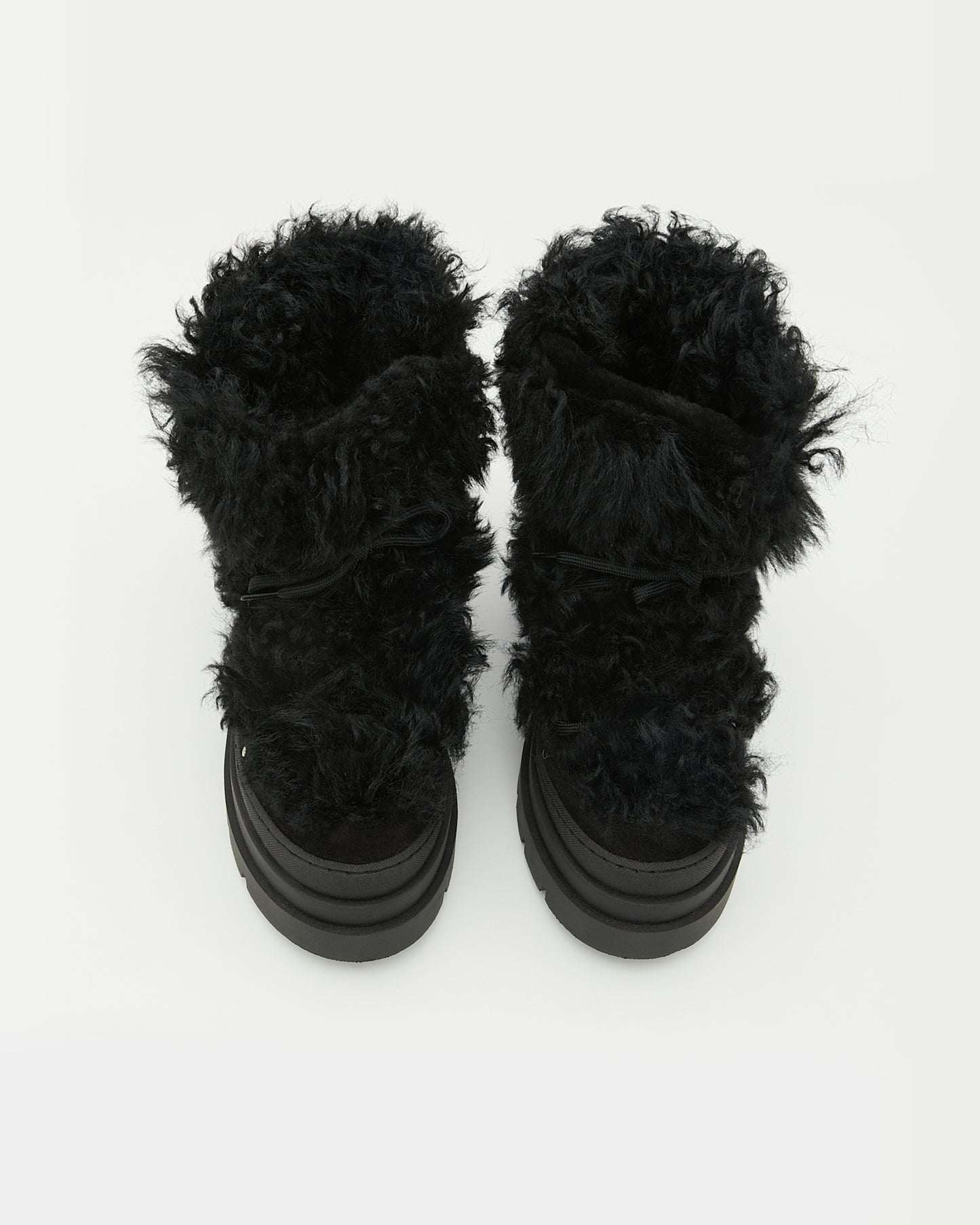 Ankle boots in leather and Lacon shearling