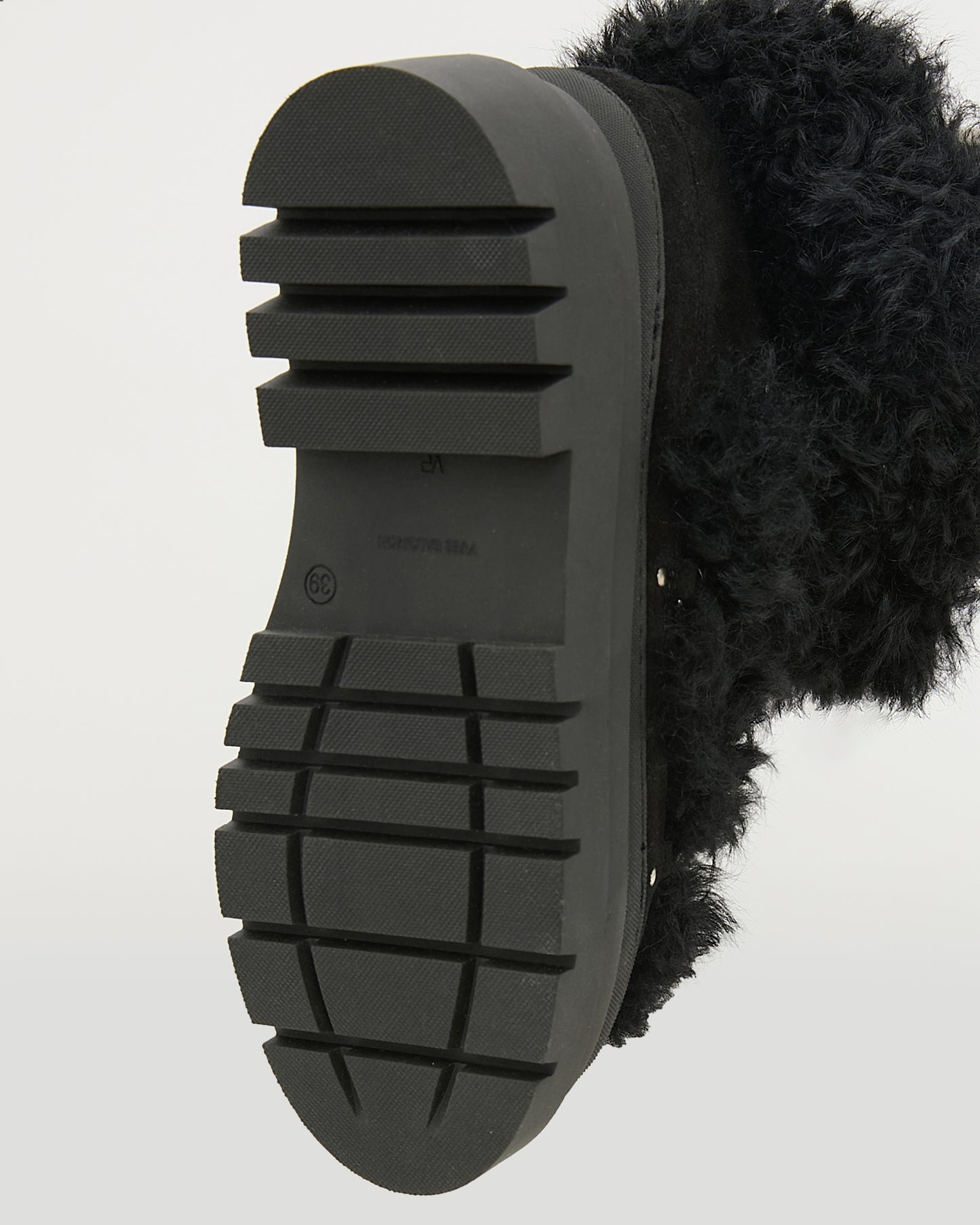 Ankle boots in leather and Lacon shearling