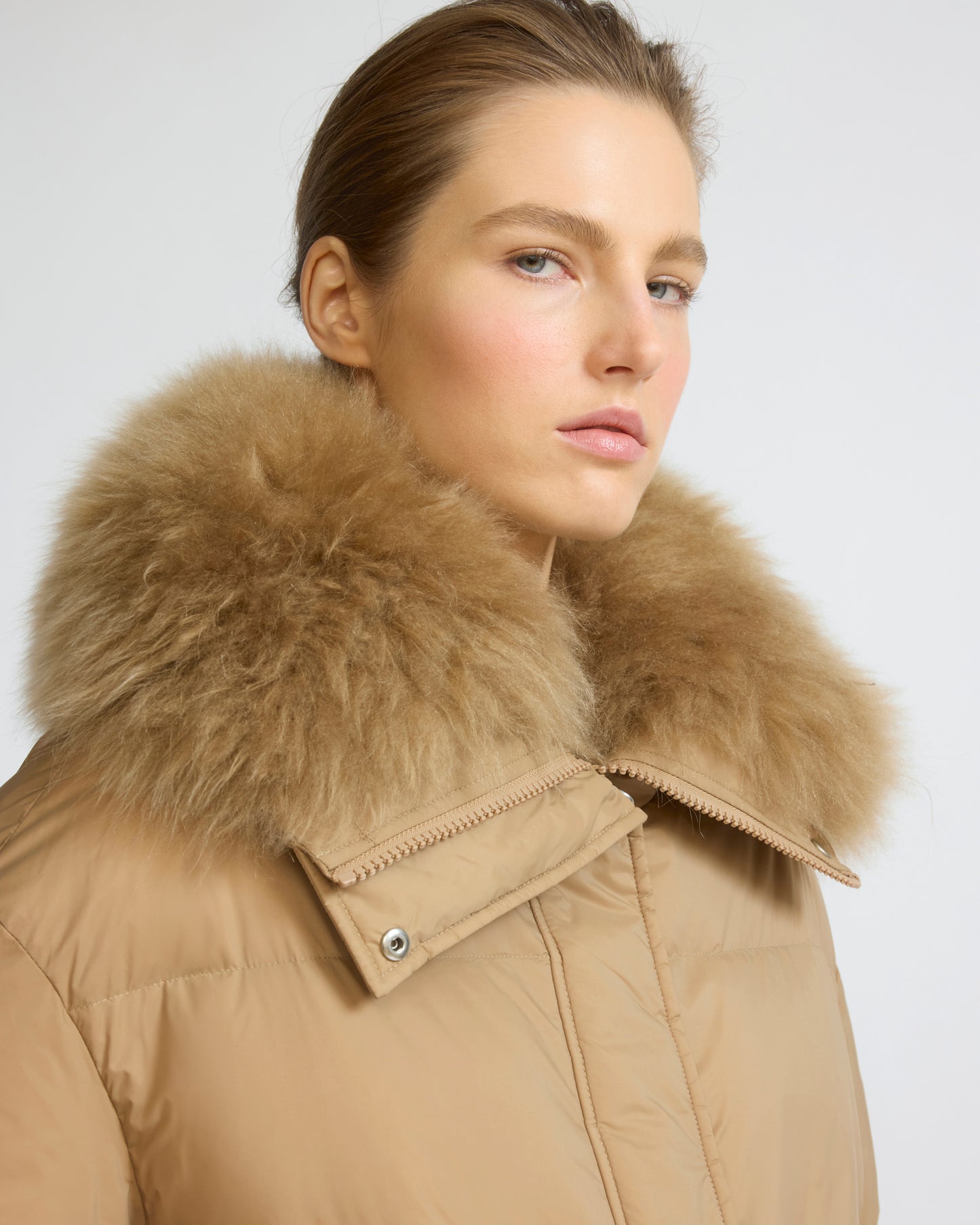 Short down jacket in waterproof technical fabric with airy lambswool trim