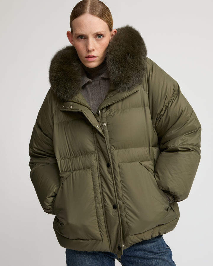 Short down jacket with raglan sleeves and fox fur trim