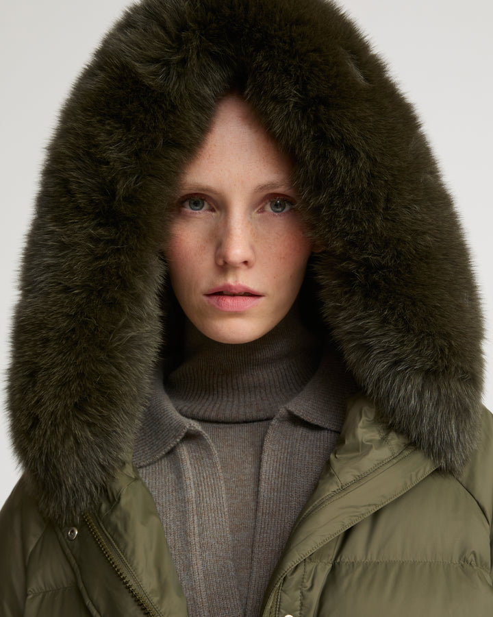 Short down jacket with raglan sleeves and fox fur trim