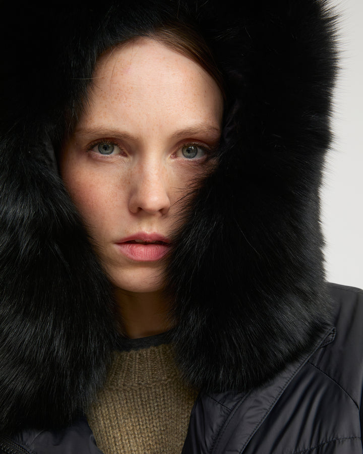 Short down jacket with raglan sleeves and fox fur trim