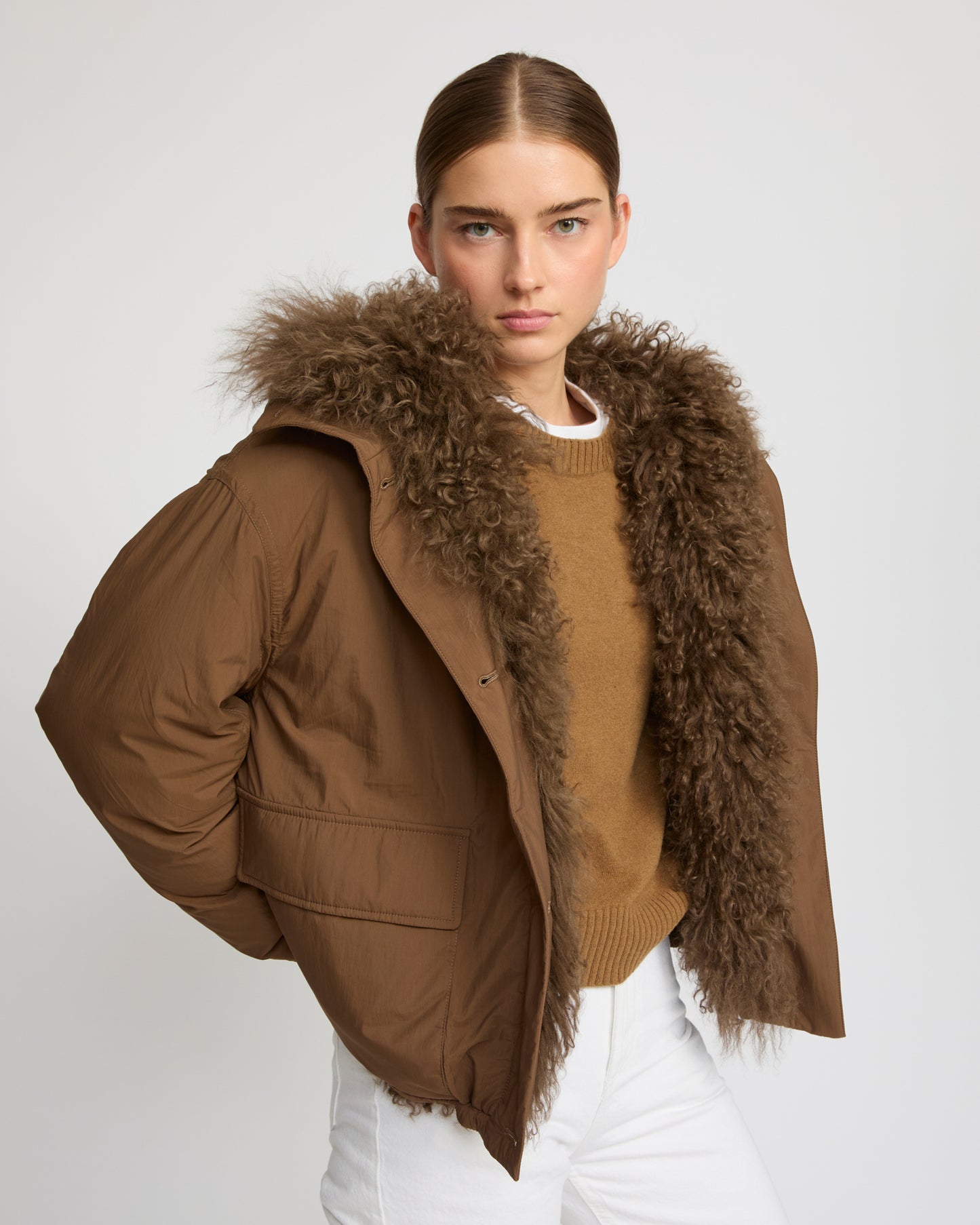 Short ultra-light down jacket with curly lambskin trim