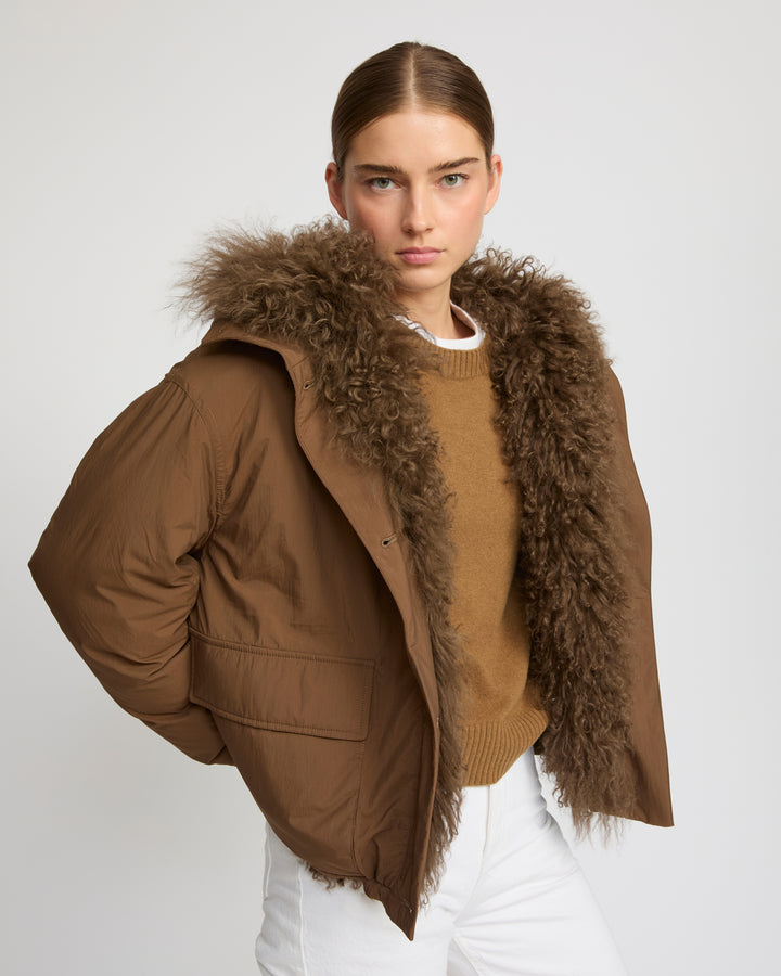 Short ultra-light down jacket with curly lambskin trim