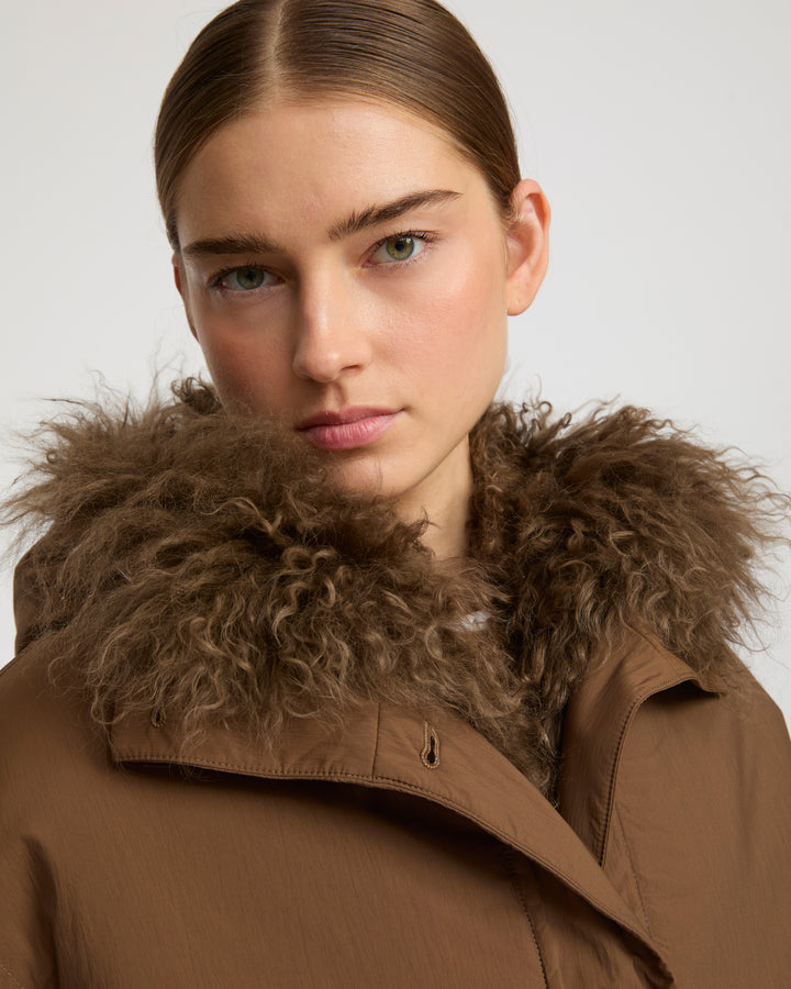 Short ultra-light down jacket with curly lambskin trim