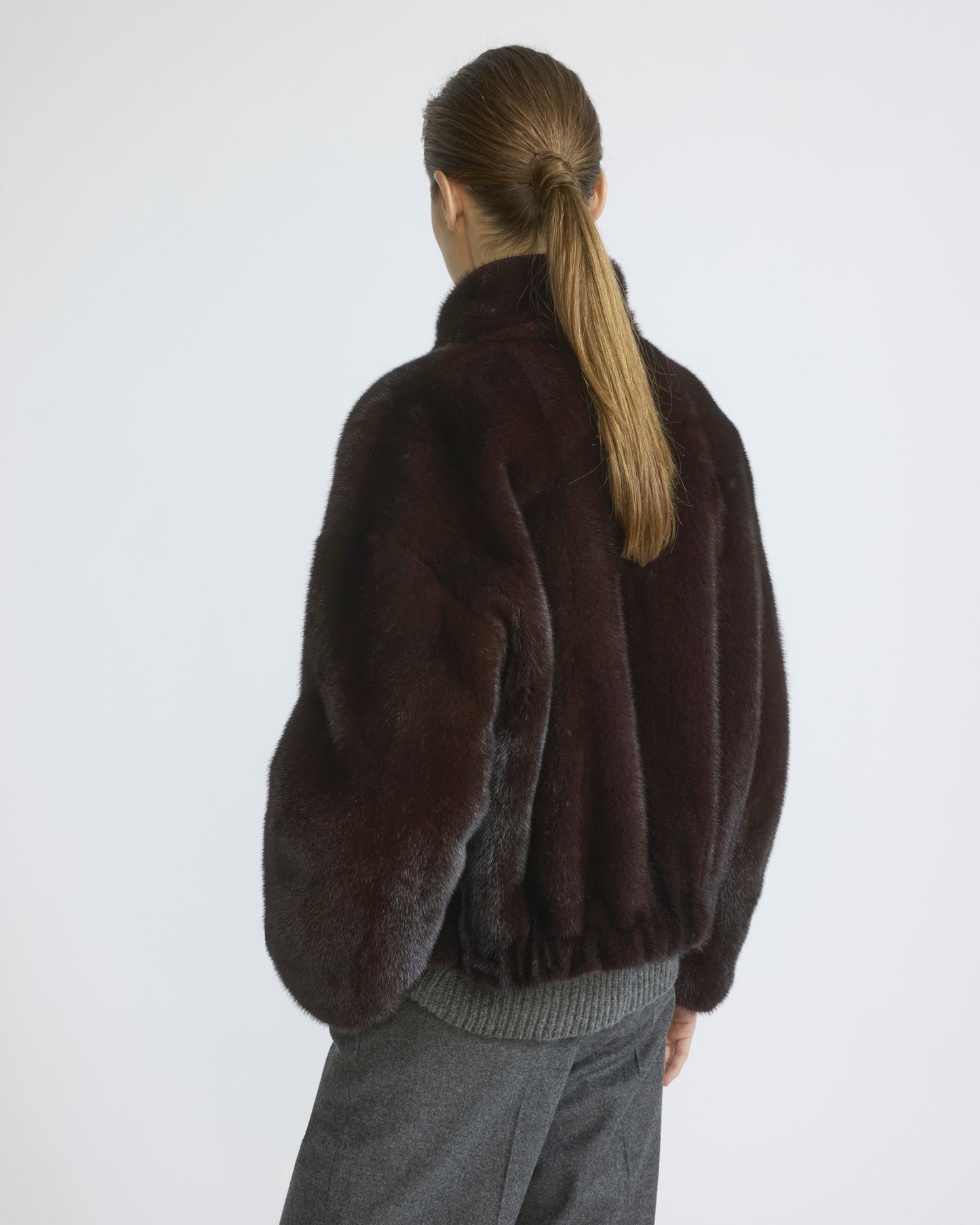 Reversible water-repellent technical fabric jacket with mink fur