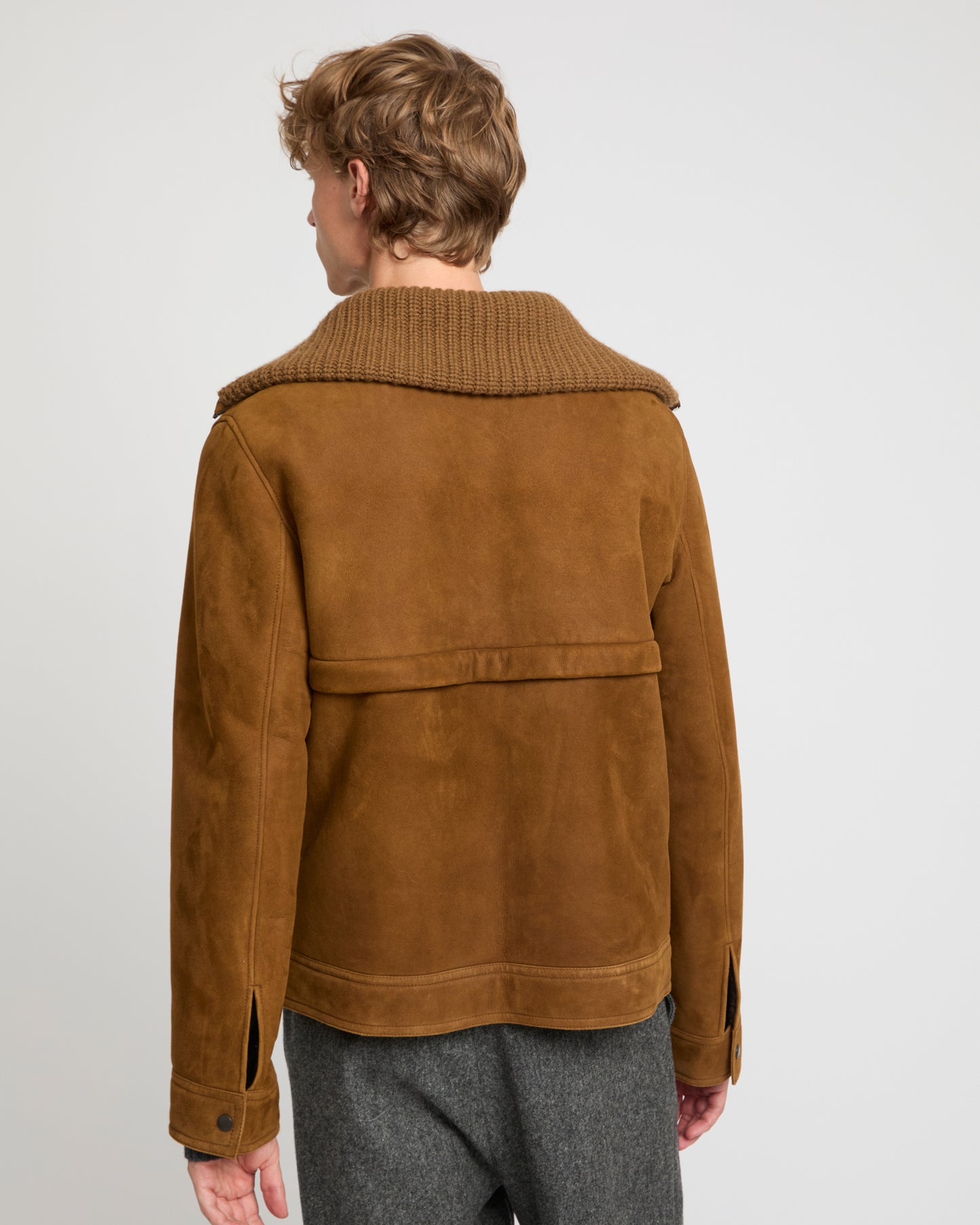 Veste en peau lainée d'agneau à col maille