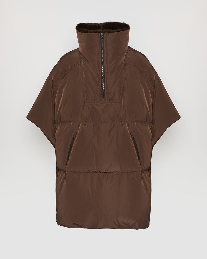 Technical fabric down cape with mink fur stand collar and lining.