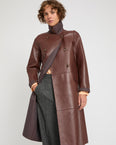 Manteau long en cuir d'agneau doublé tissu motif pied-de-poule