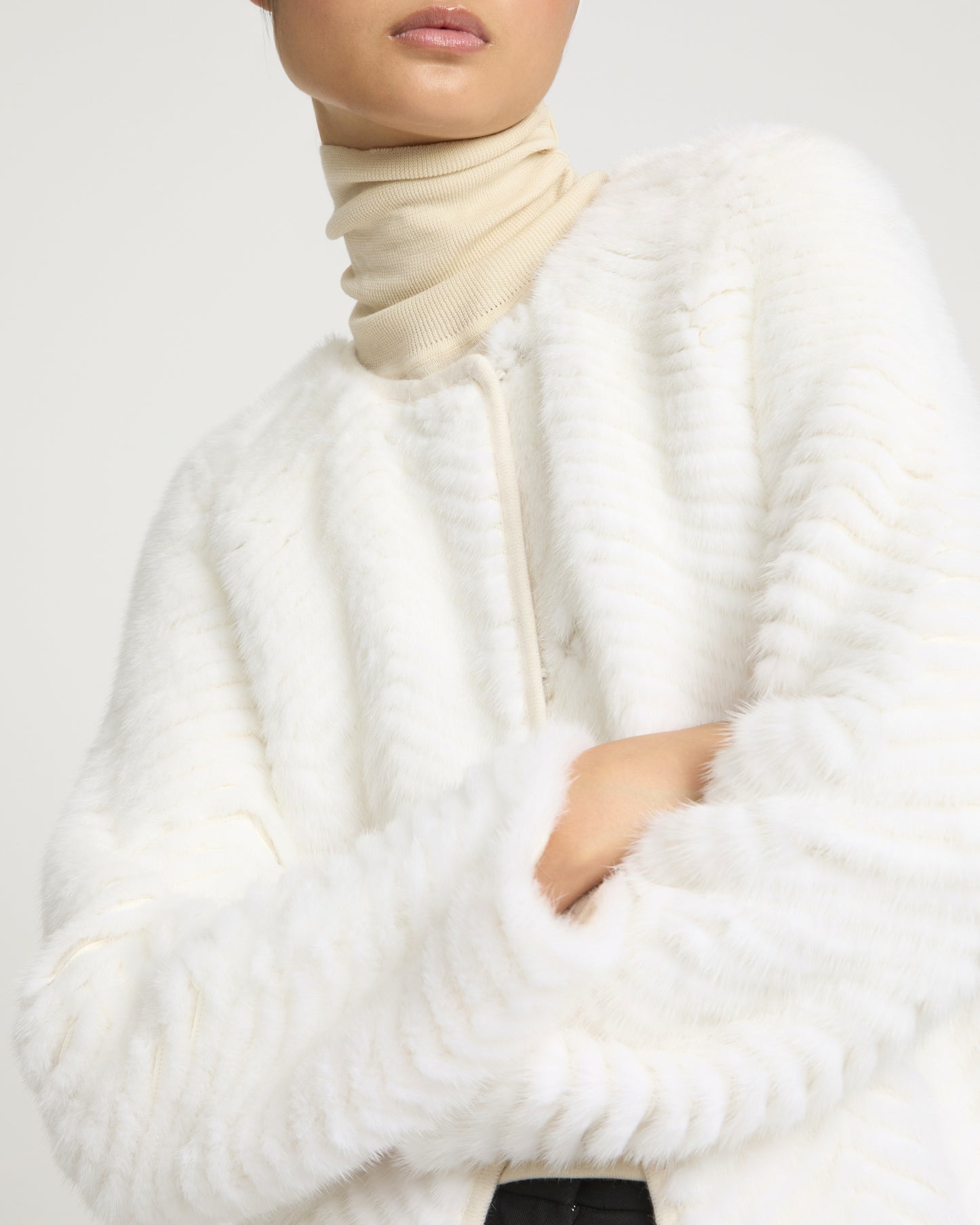 Long coat in Merino knit and mink fur