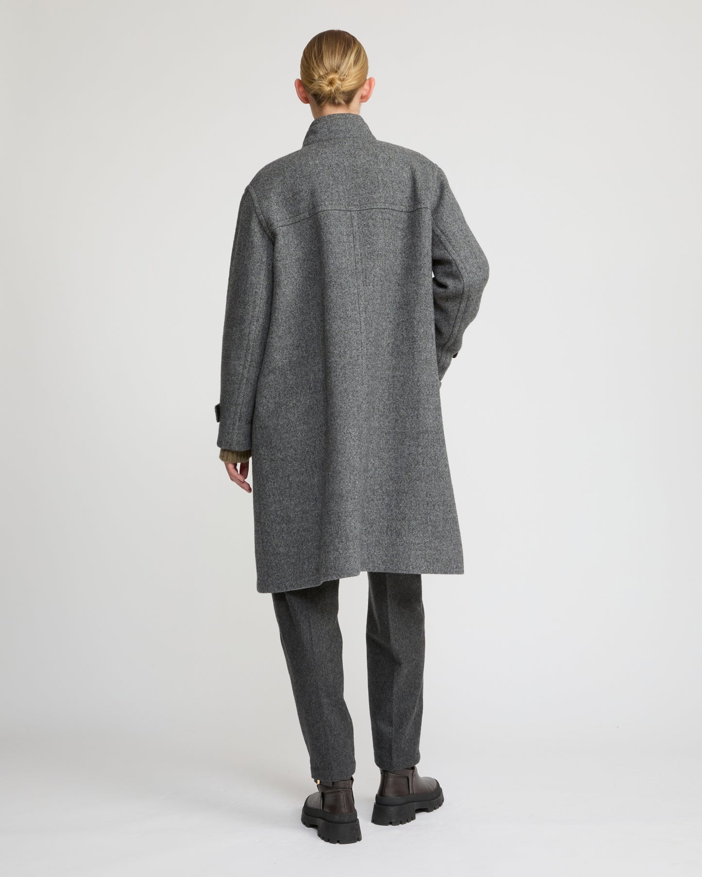 Long coat in wool with leather details