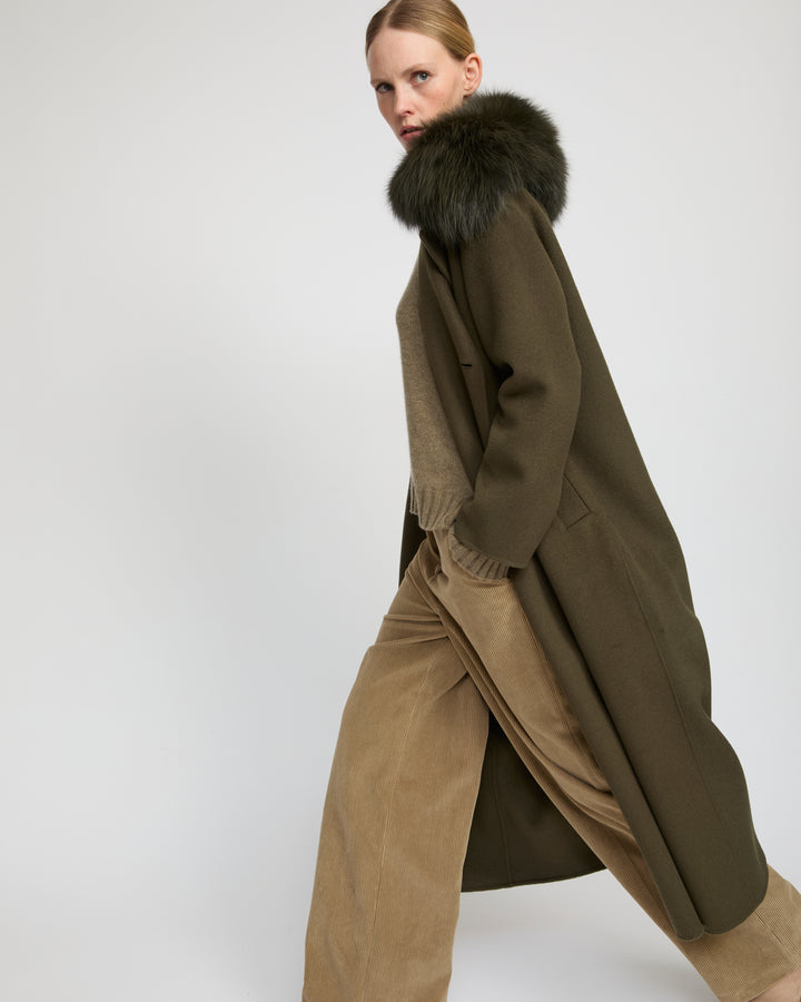 Belted coat in cashmere wool with fox fur collar