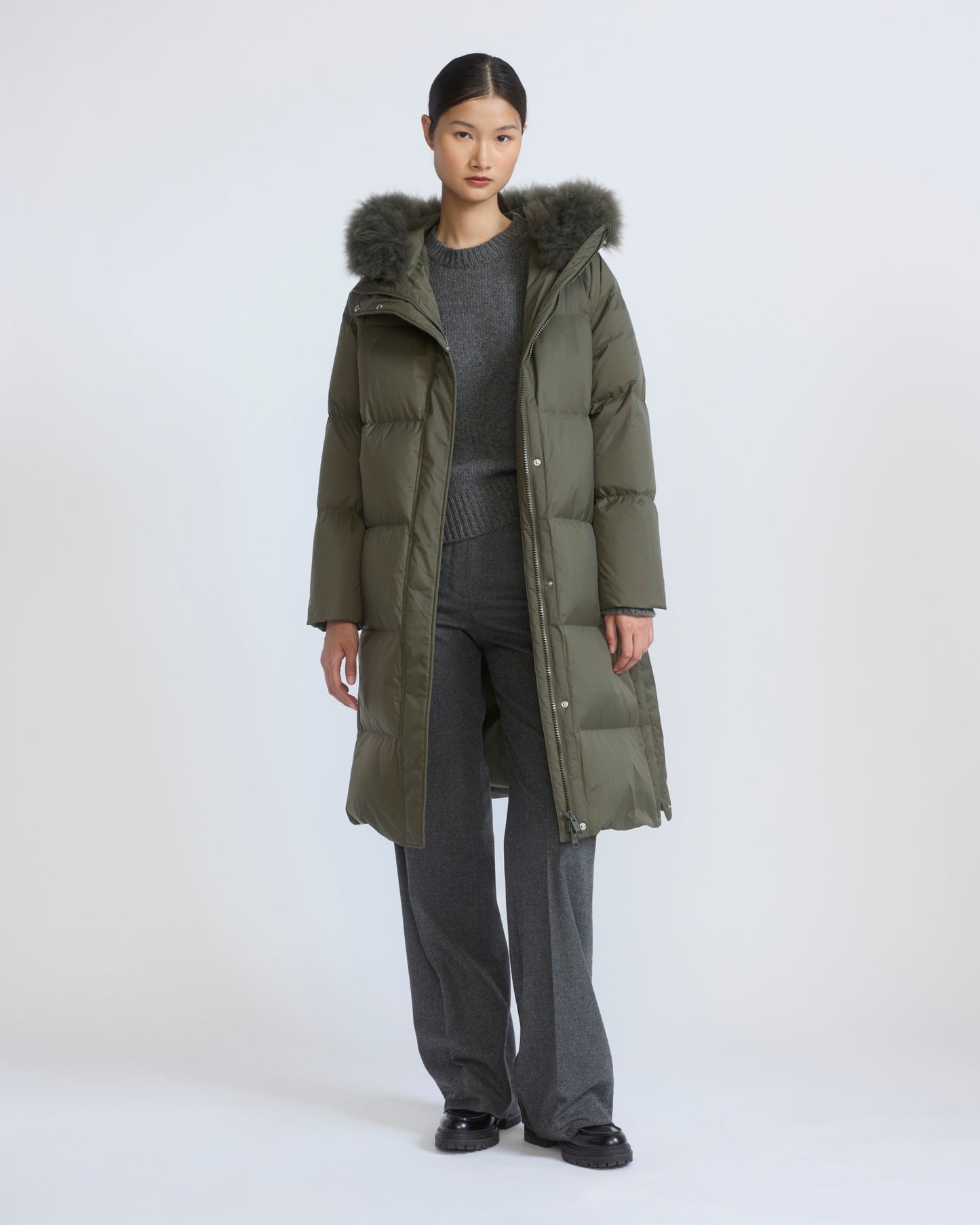 Long down jacket in waterproof technical fabric with airy lamb wool trim
