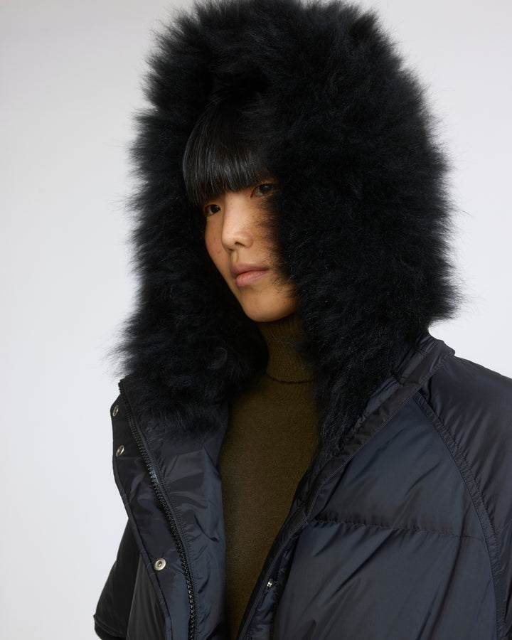 Doudoune longue en tissu technique imperméable et agneau laine vaporeuse