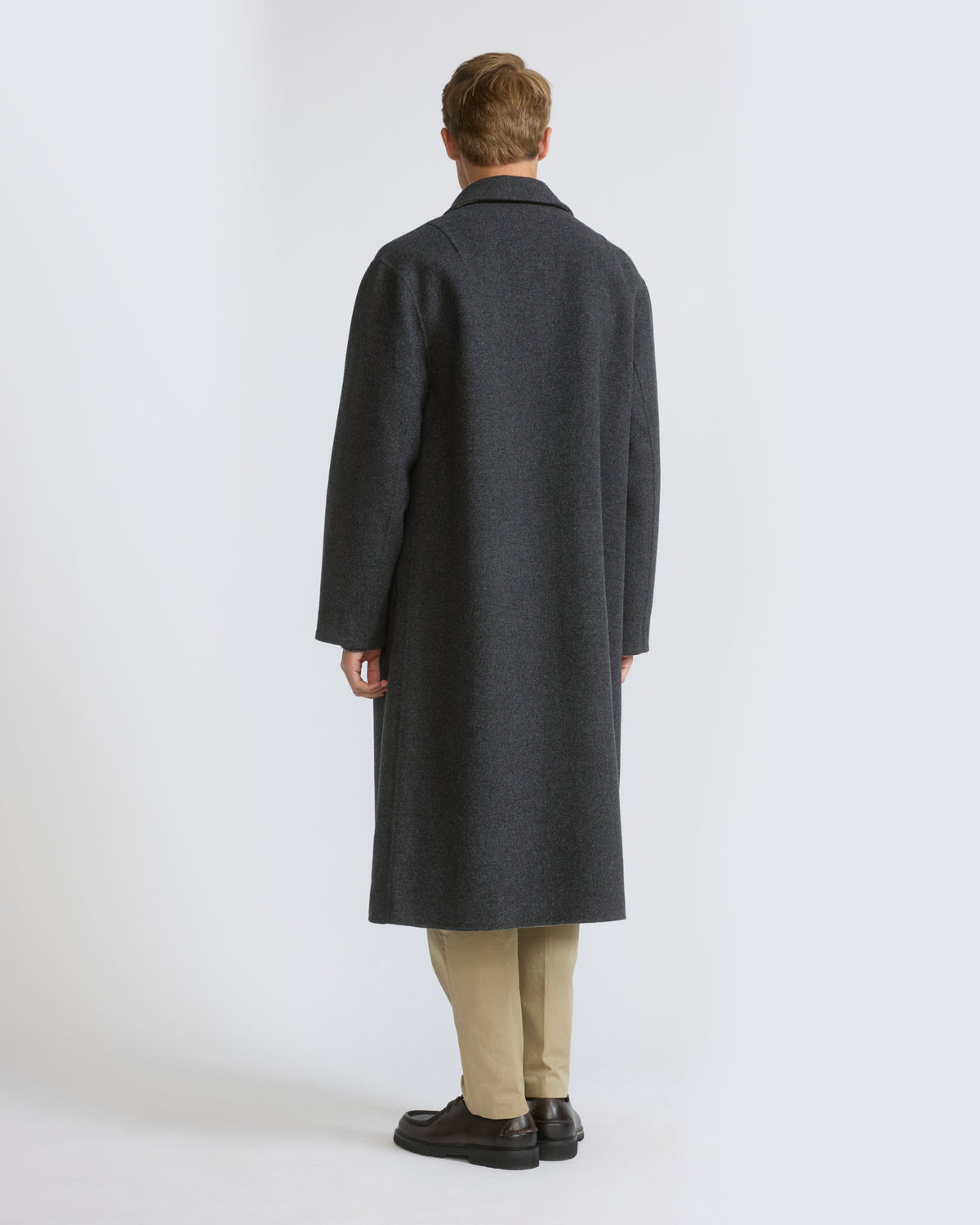 Manteau en lainage double face avec intérieur à carreaux