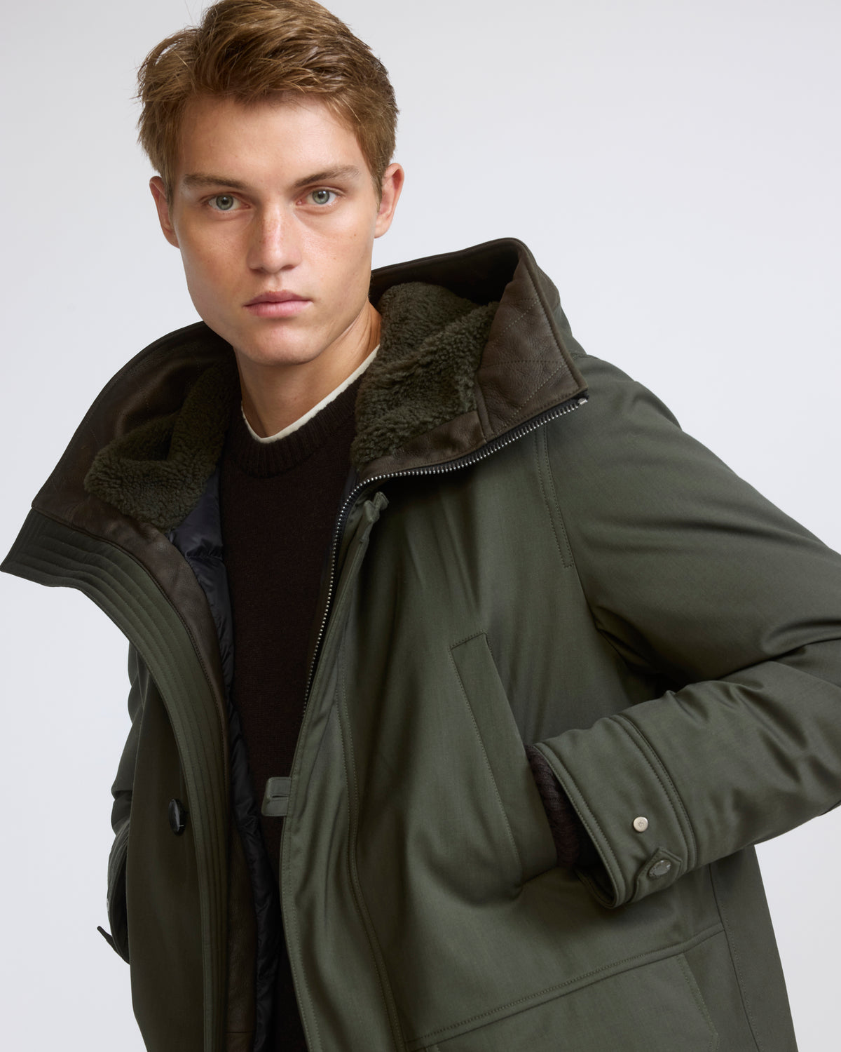 Parka longue en tissu technique laine mélangée waterproof et peau lainée d'agneau