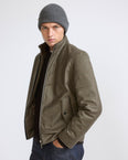 Down jacket in Loro Piana waterproof fabric with plucked mink fur trim