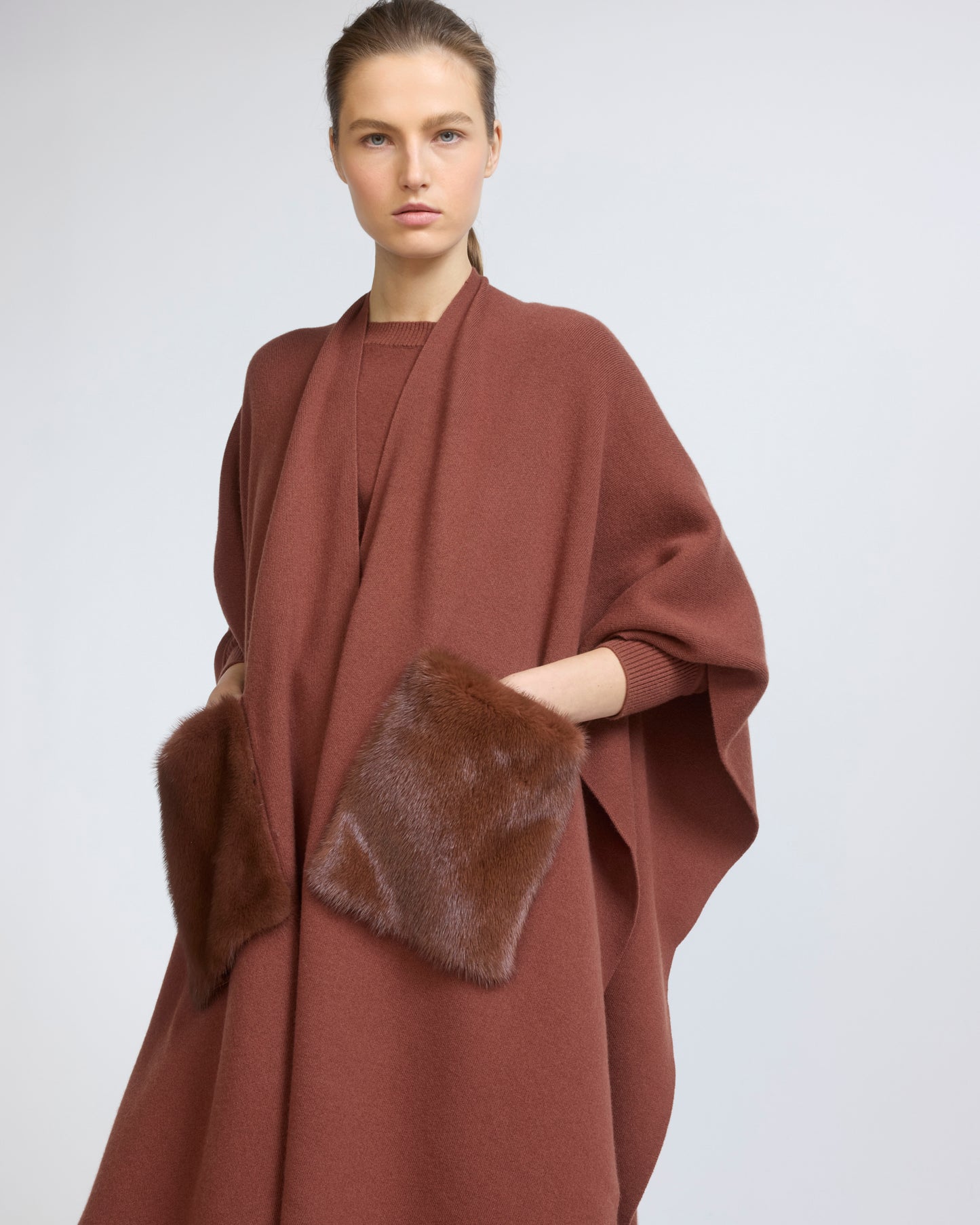 Merino knit poncho with mink fur