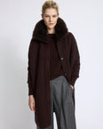 Manteau en maille Mérinos et col en agneau cachemire