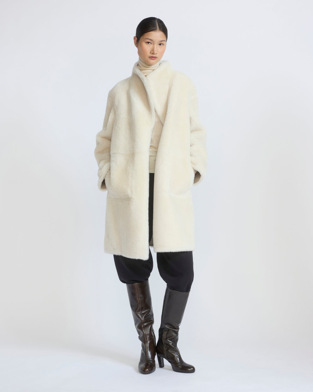 Manteau réversible en peau lainée d'agneau Mérinos raide