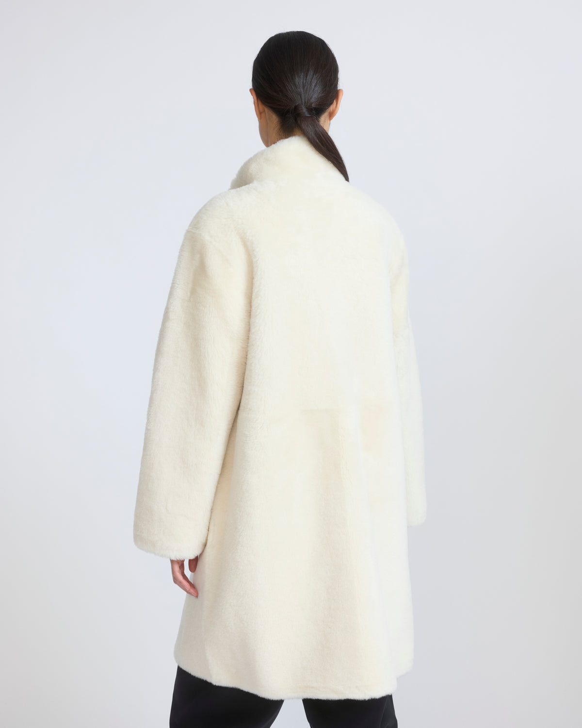 Manteau réversible en peau lainée d'agneau Mérinos raide