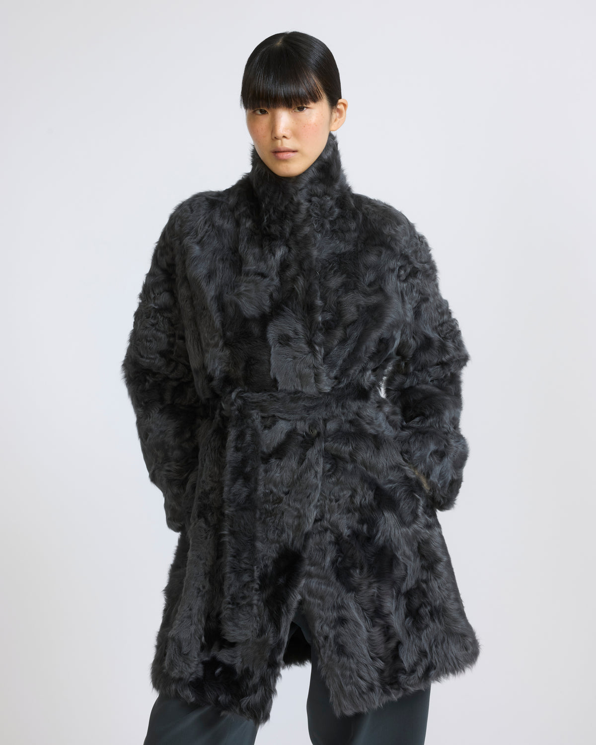 Manteau en agneau frisé