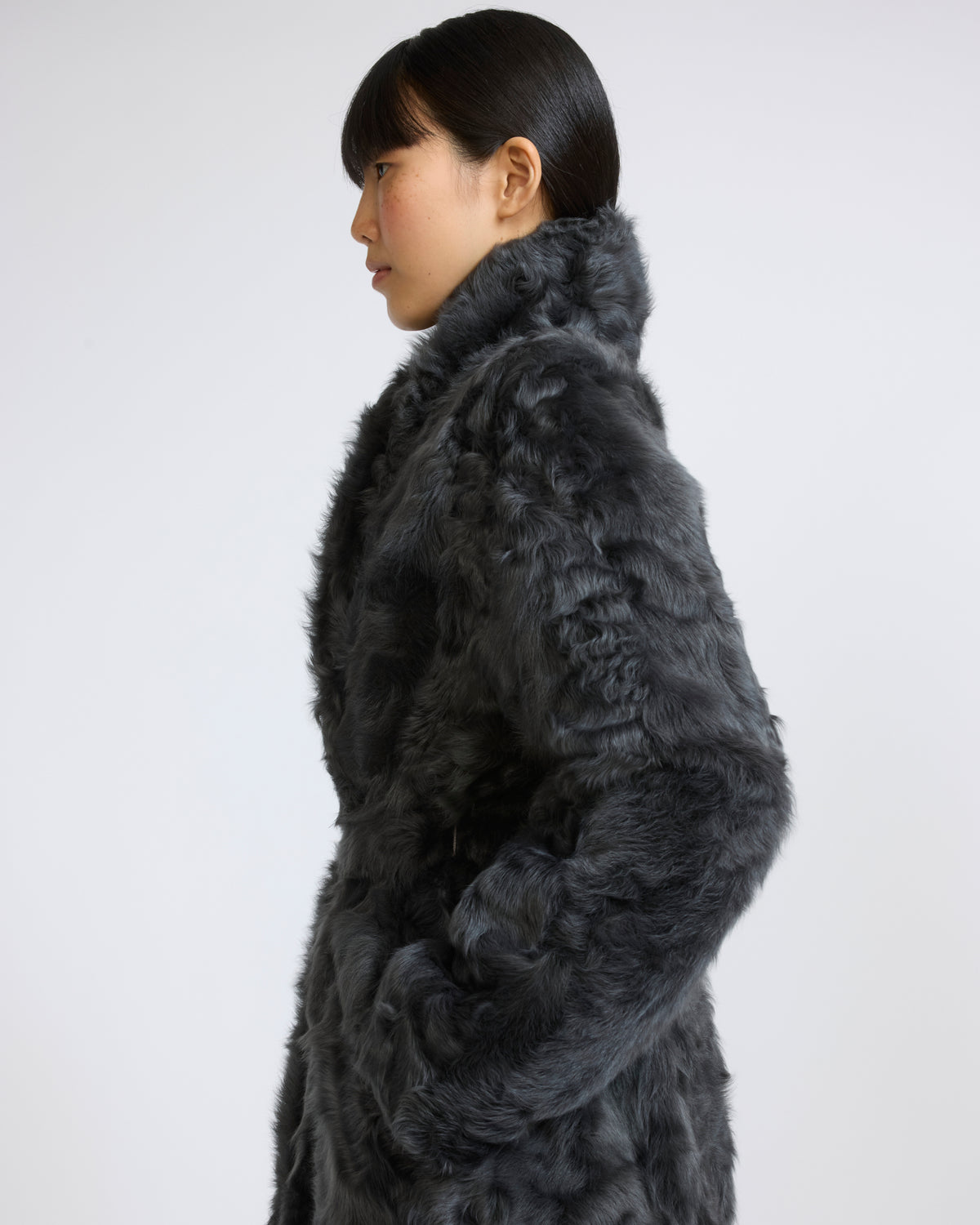Manteau en agneau frisé