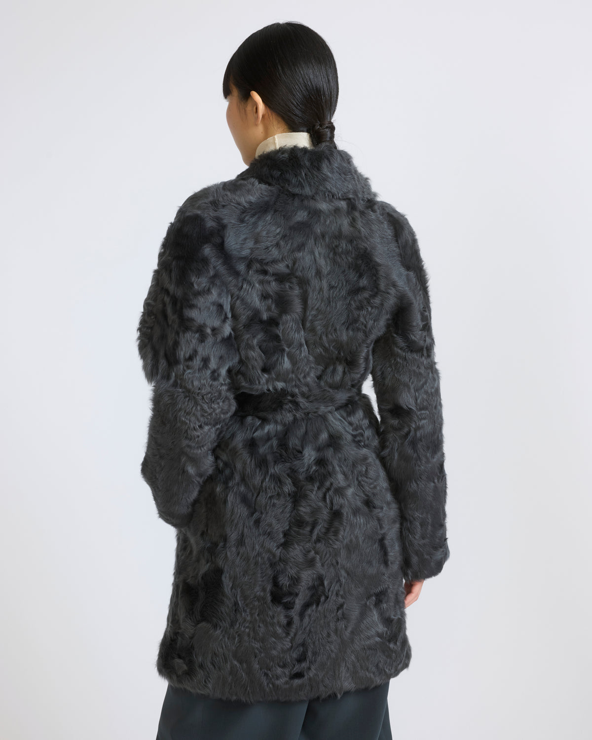 Manteau en agneau frisé