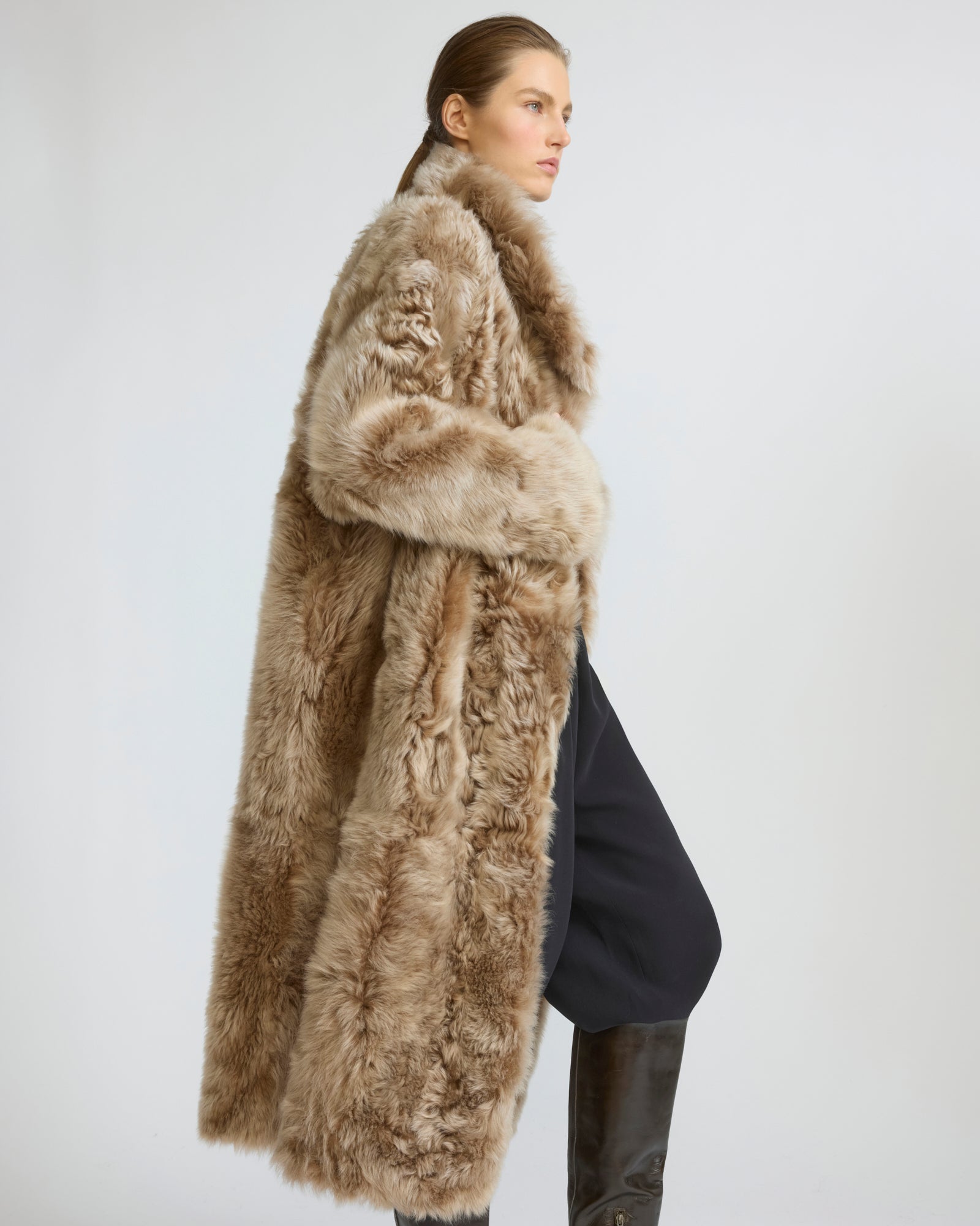 Manteau long réversible en peau lainée d'agneau