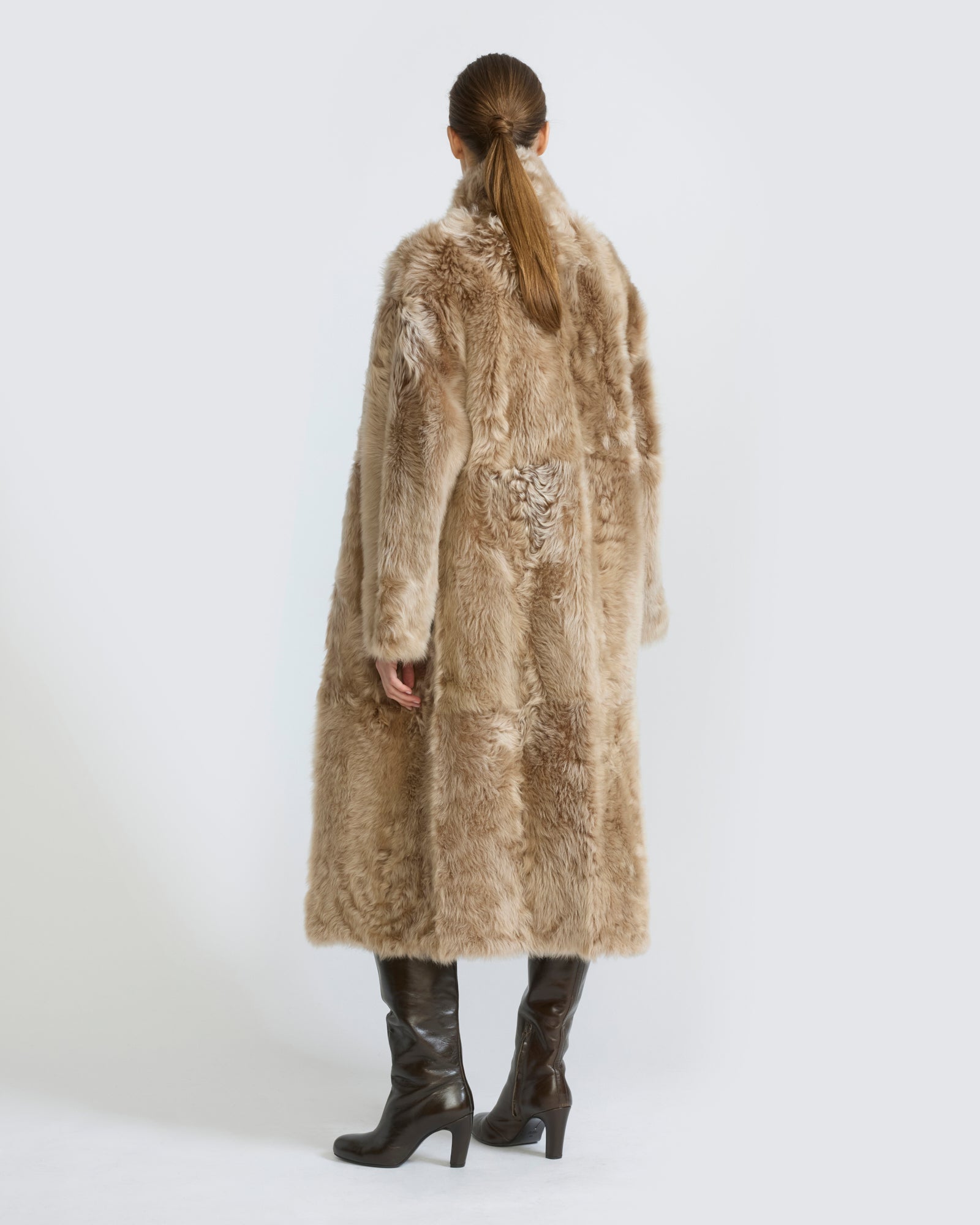 Manteau long réversible en peau lainée d'agneau
