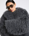 Merino knit jacket with curly long hair lambskin shearling