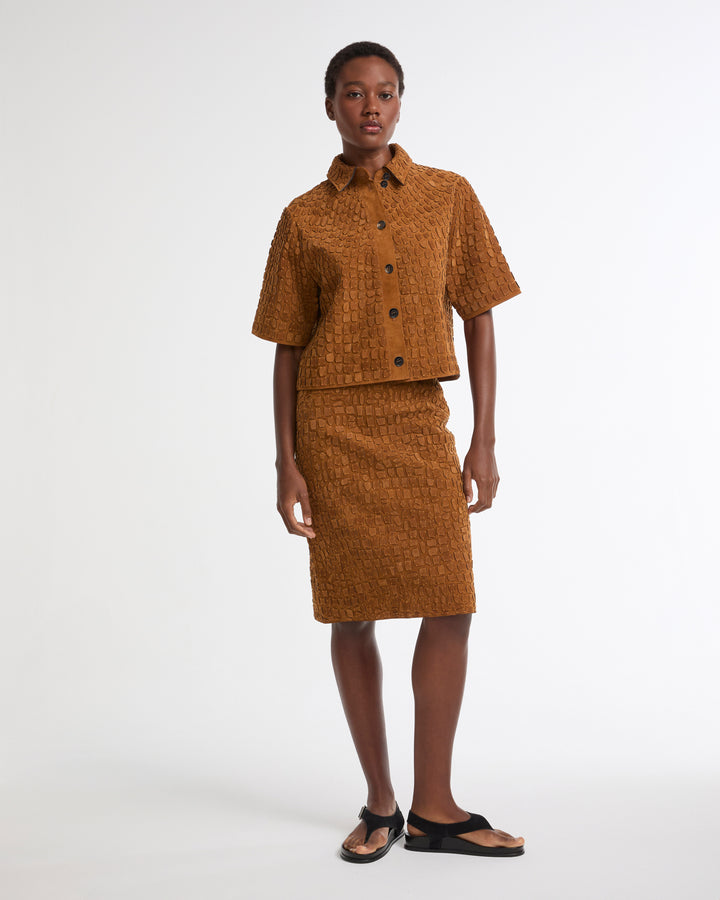 Mid-length suede calfskin skirt with crocodile-effect embossing