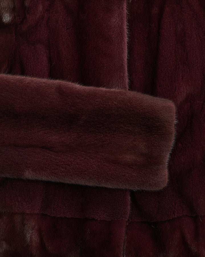 Collarless coat in long-haired mink