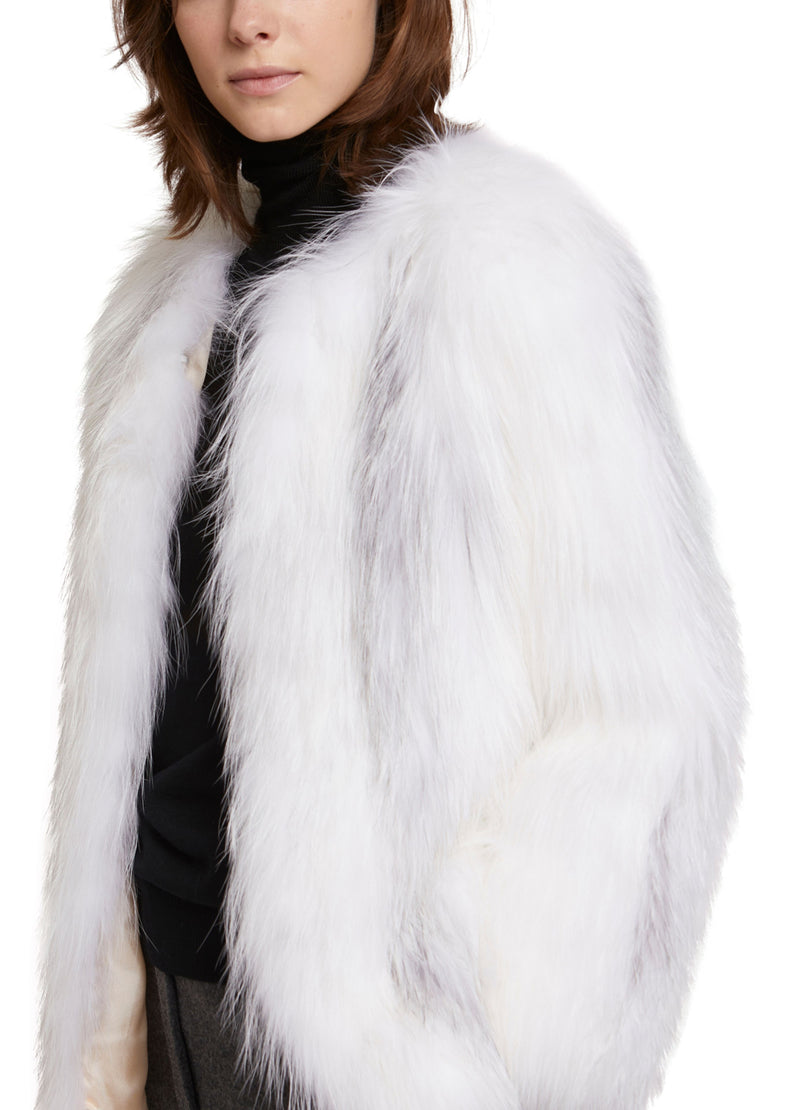 Veste courte en renard tricoté