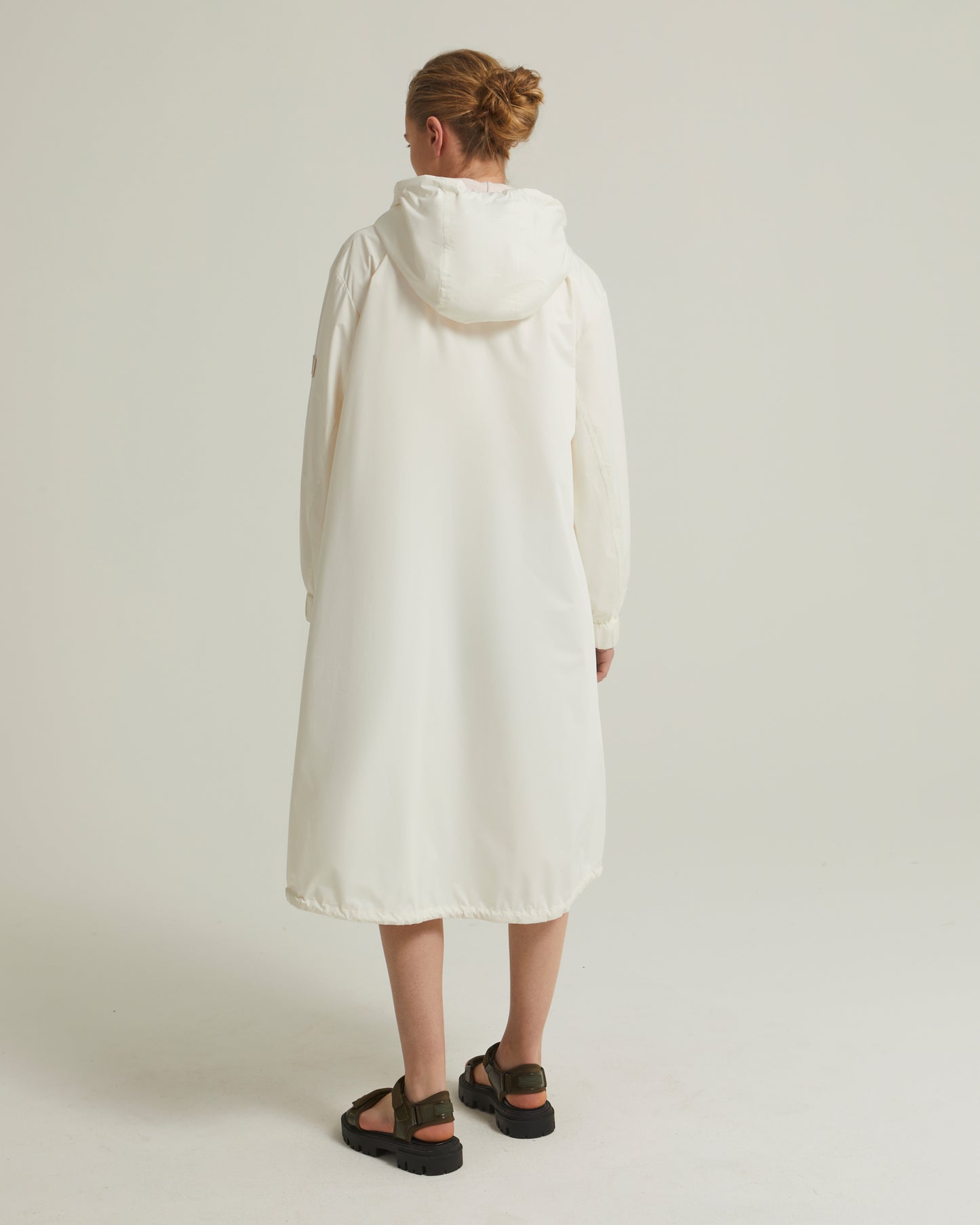 Manteau ceinturé en tissu technique imperméable