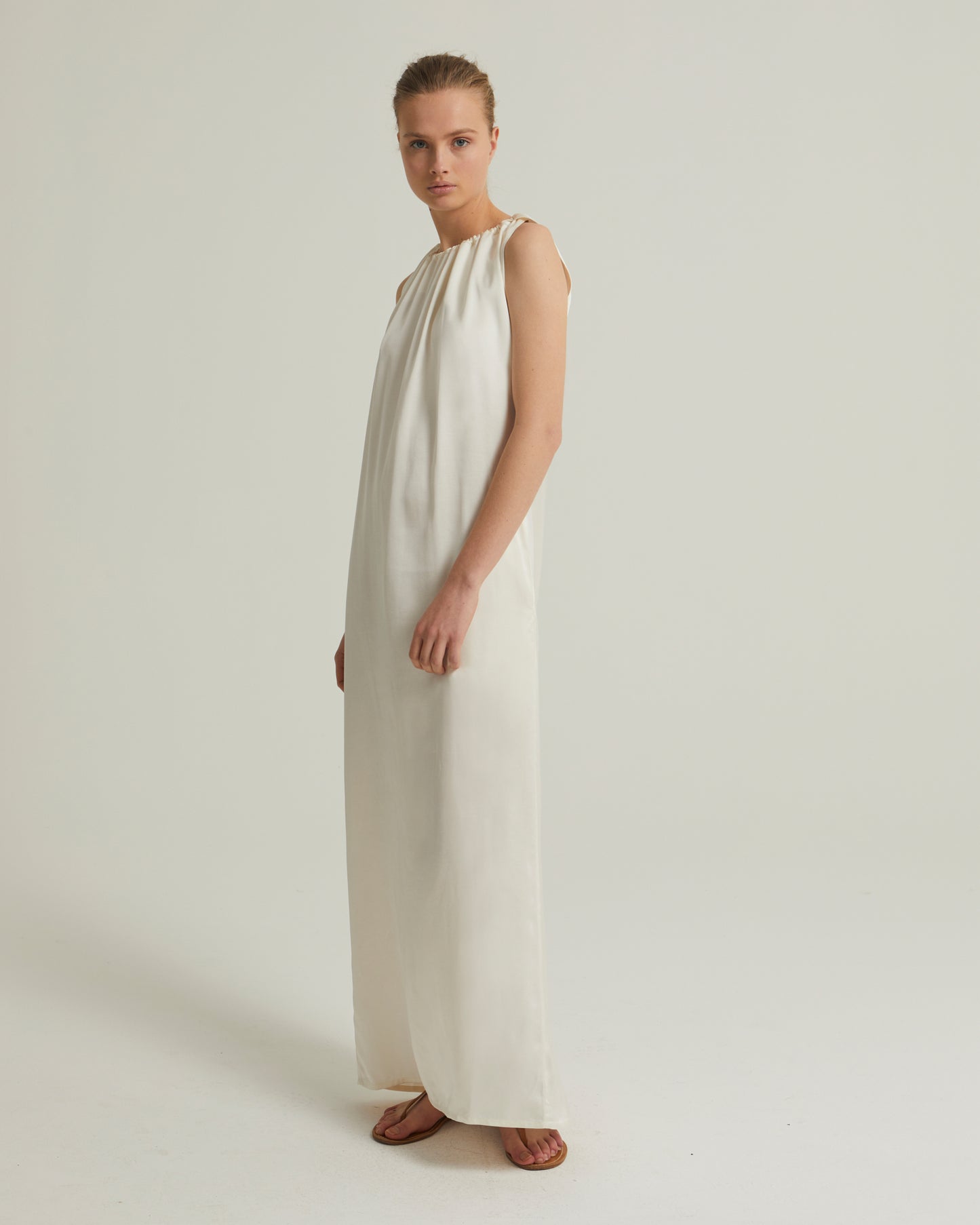 Long dress with adjustable satin neckline