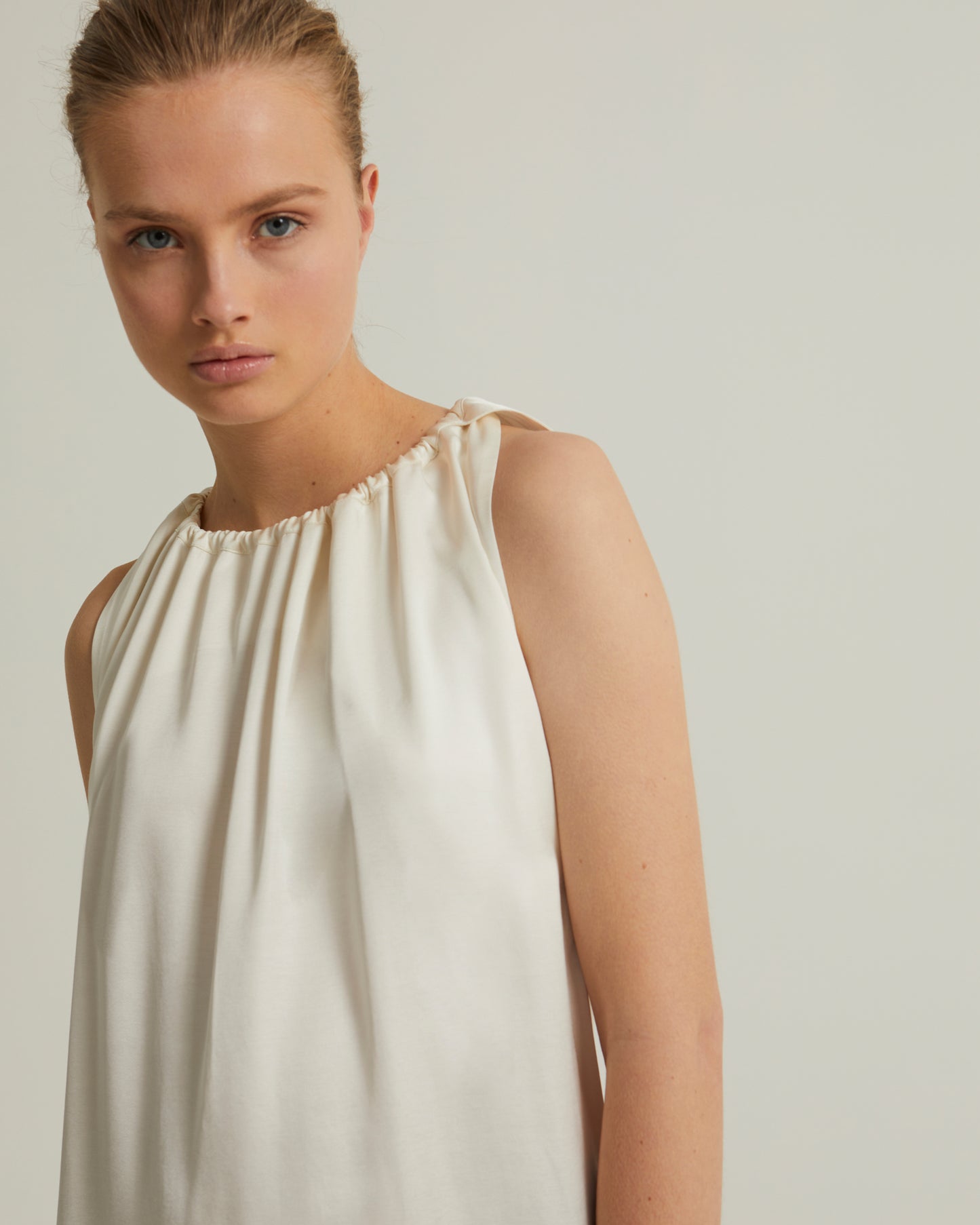 Long dress with adjustable satin neckline